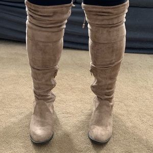 Tan over the knee boots that tie with drawstrings